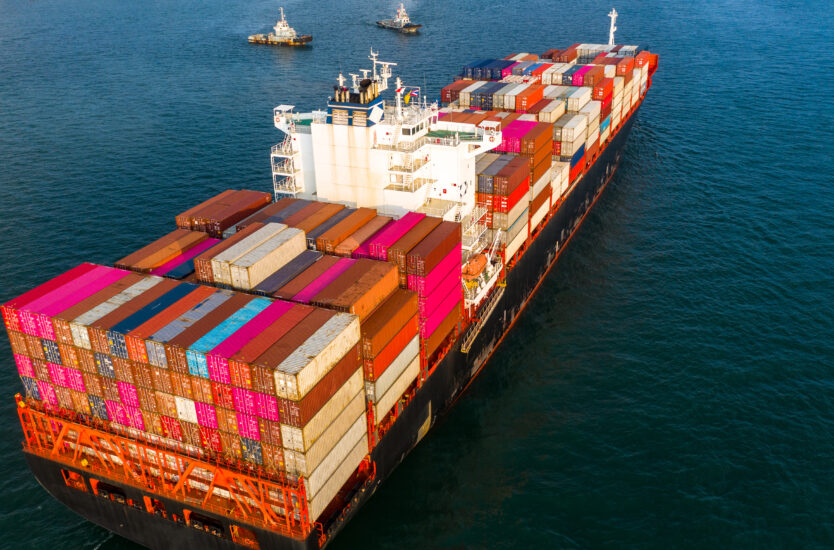 Aerial view container ship carrying container in import export b
